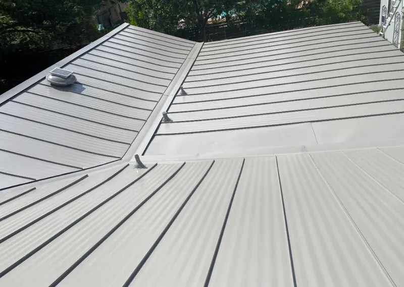 Solar attic fan installed on a metal roof for Roof Ventilation in Cusseta-Chattahoochee County
